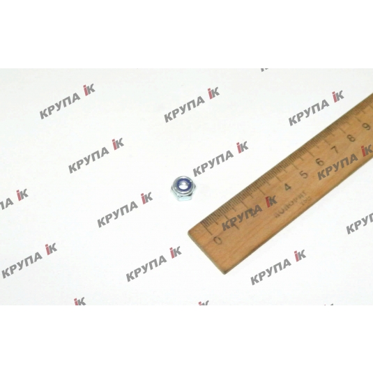 Гайка глазка пальця шнека жниварки 1030